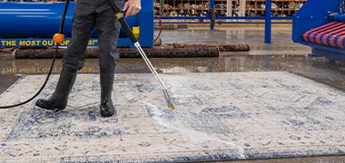 cleaning and rinsing area rug