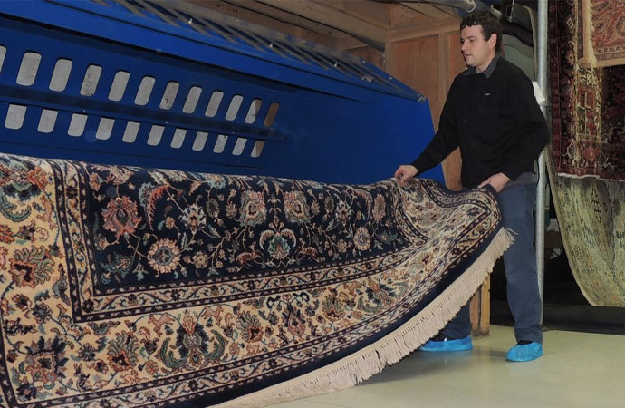 Dusting Oriental Carpet